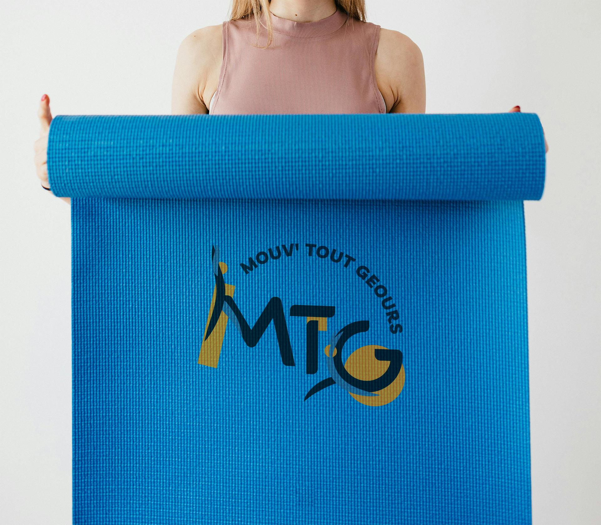 Tapis de gym décoré avec un logo réalisé par Studio Abélia